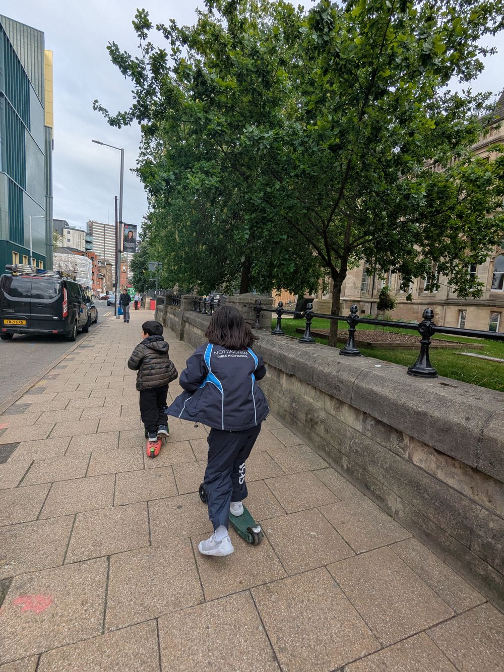 Walking/scooting into town for an after school dinner treat 